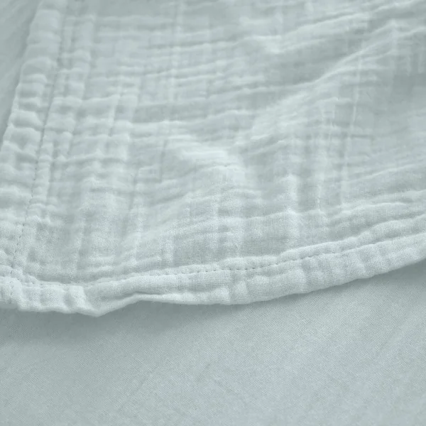 Drap housse MILOS mousseline de coton 140x200 cm bonnet 30 cm uni vert lichen